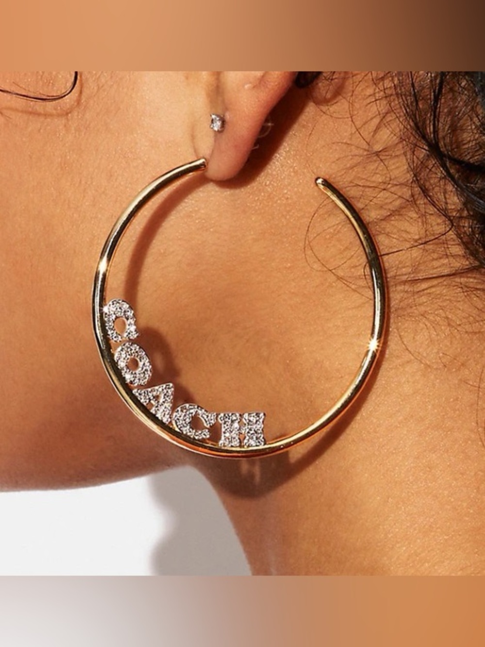 Coach Gold Hoop Earrings with Crystal Logo Accents